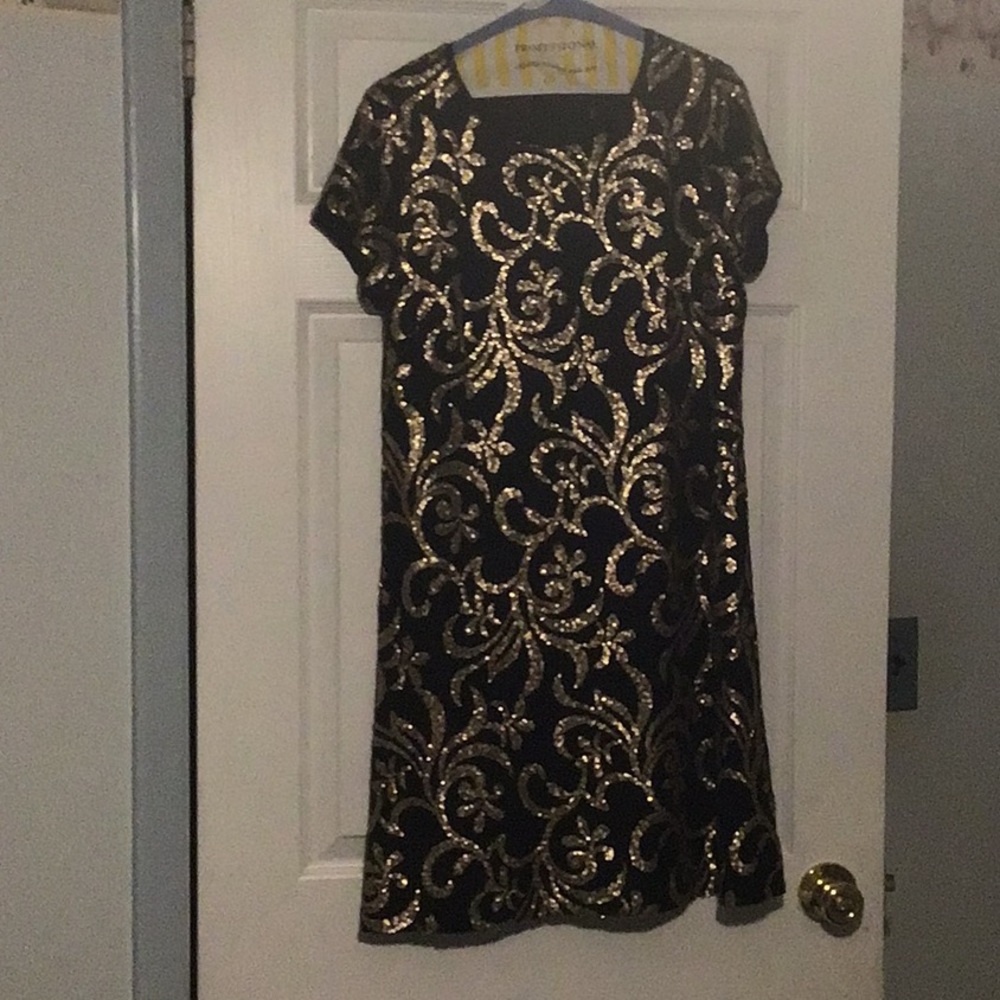 Sequined black cocktail dress